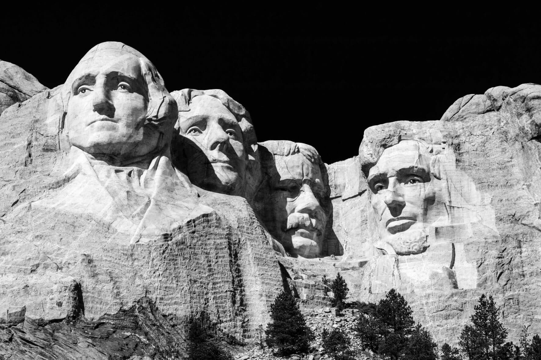 mount rushmore with a black background